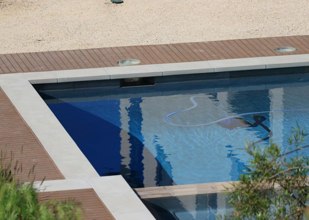 Clear blue swimming pool maintained by Freedom Pool Service in Concord NC